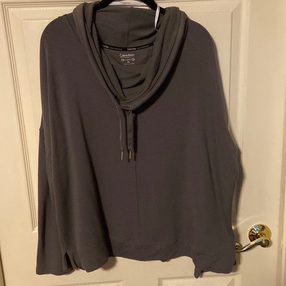 Calvin Klein Performance Stretch Long Sleeve Top with Draw string neck.